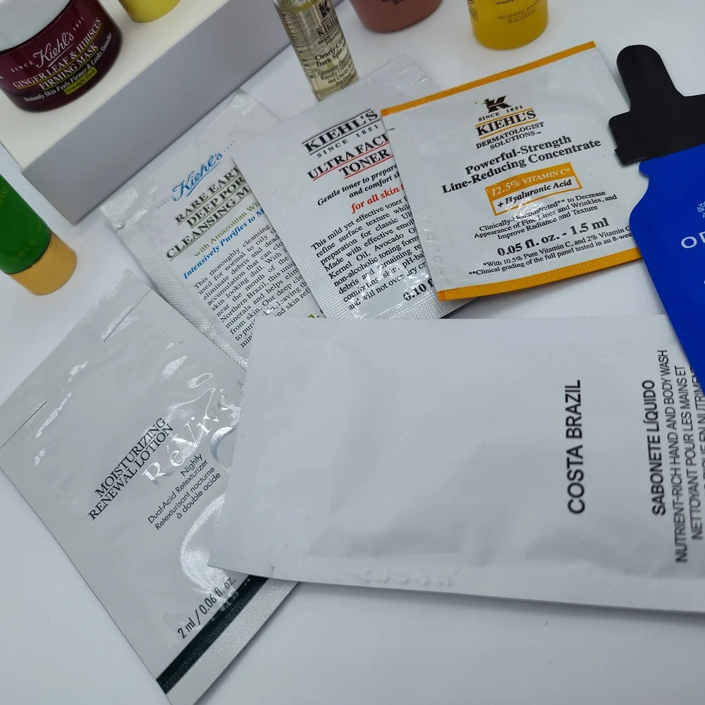 Giorgio Armani Velvet Beauty Bag,  Kiehl’s Oribe Kerastase Tata Harper Samples